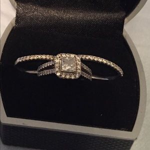 Diamond engagement ring. two side wedding bands